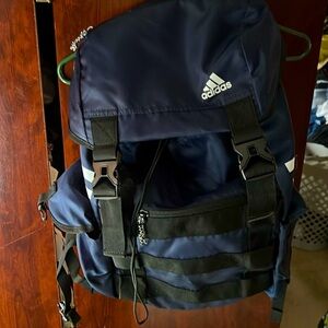 Navy blue Adidas backpack. Perfect for work or school.